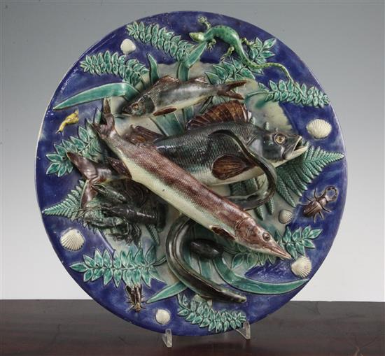A Palissy style faience dish, late 19th century, 38cm., slight restorations